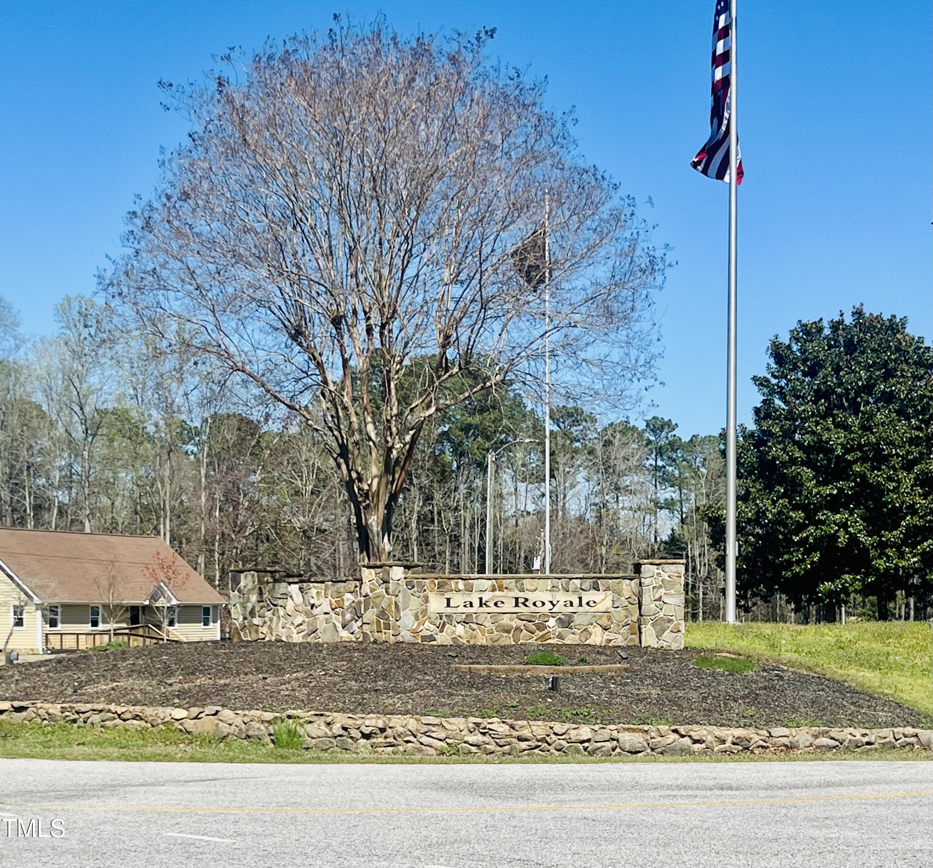 119-121 Osage Drive Spring Hope, NC 27882 - Photo 5 of 5 a view of a yard with a house