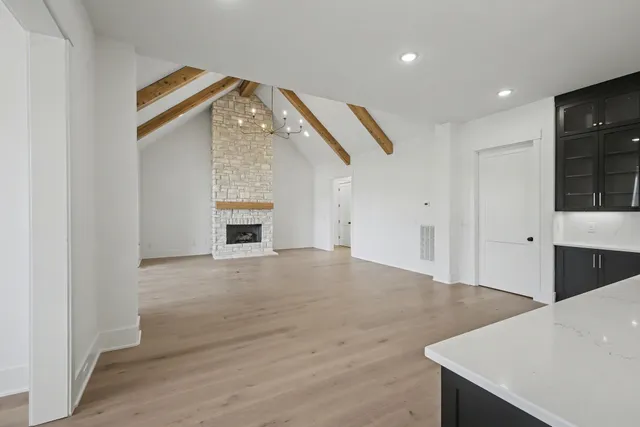 a view of a living room with windows