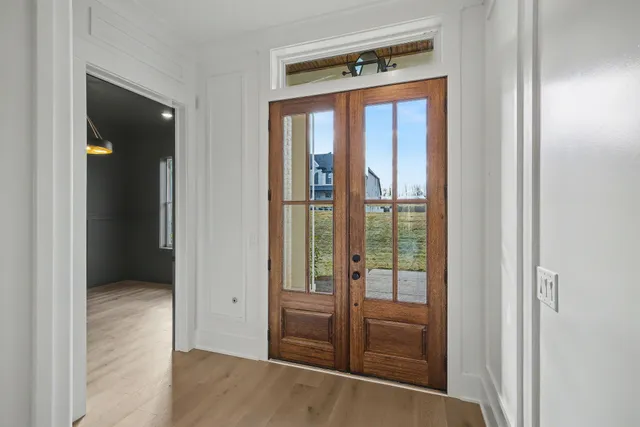 a large kitchen with stainless steel appliances kitchen island granite countertop a large counter top and oven