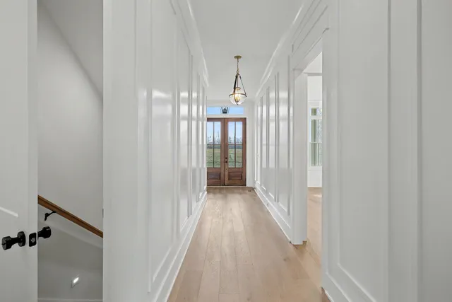 a kitchen with stainless steel appliances granite countertop a stove a refrigerator and a sink