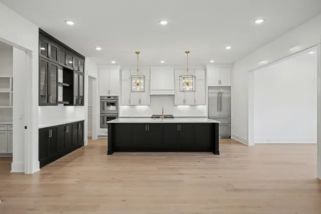 a view of cabinets and wooden floor