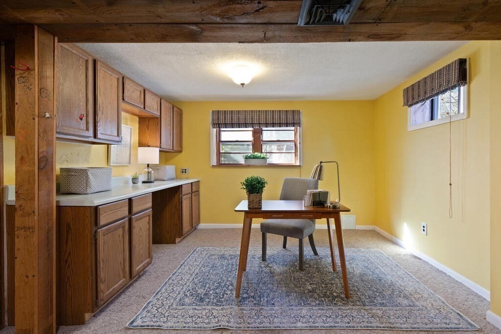 34 Locust Street Burlington, MA 01803 - Photo 18 of 24 a view of a dining room with furniture and window
