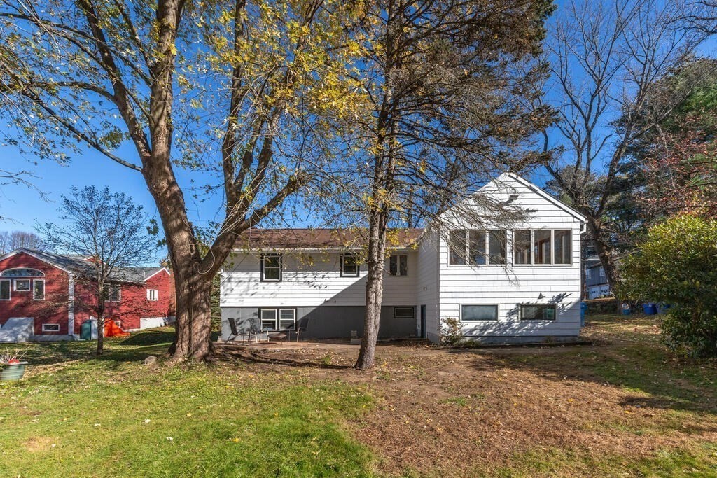 34 Locust Street Burlington, MA 01803 - Photo 21 of 24 a front view of a house with a yard