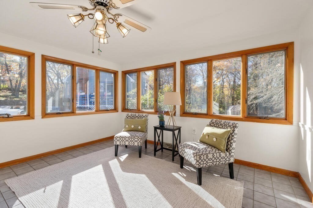 34 Locust Street Burlington, MA 01803 - Photo 10 of 24 a living room with furniture and a large window