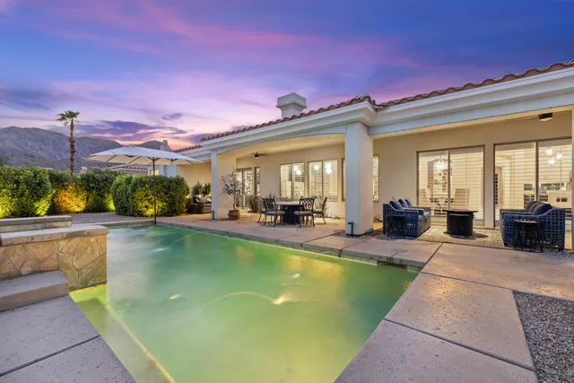 a en suite bathroom with a sink and a mirror