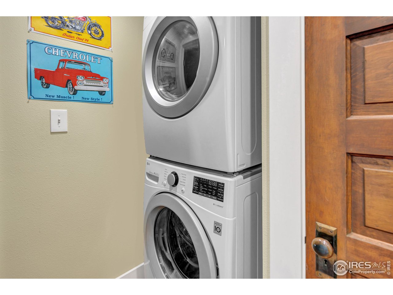 1500 West Prospect Road Fort Collins, CO 80526 - Photo 23 of 34 a view of a hallway with washer and dryer