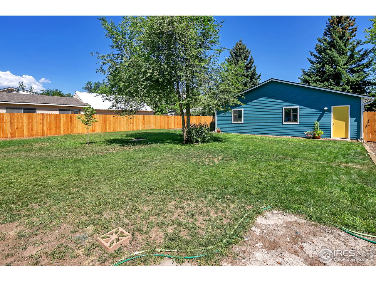 1500 West Prospect Road Fort Collins, CO 80526 - Photo 25 of 34 a view of front of a house with a yard