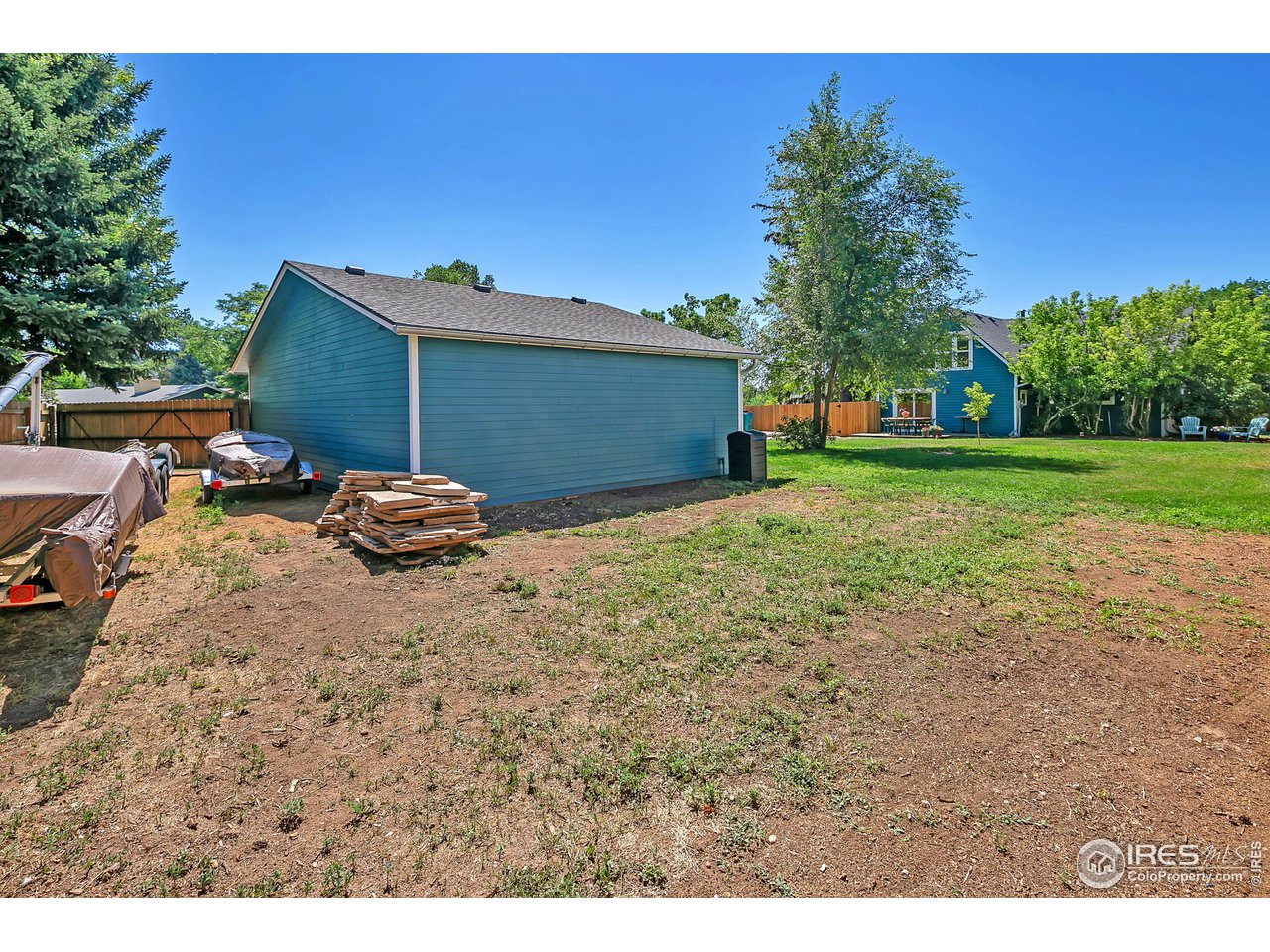 1500 West Prospect Road Fort Collins, CO 80526 - Photo 29 of 34 a backyard of a house with wooden fence