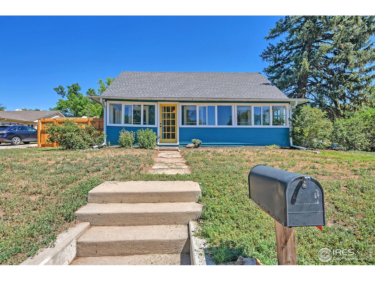 1500 West Prospect Road Fort Collins, CO 80526 - Photo 31 of 34 a front view of a house with a yard