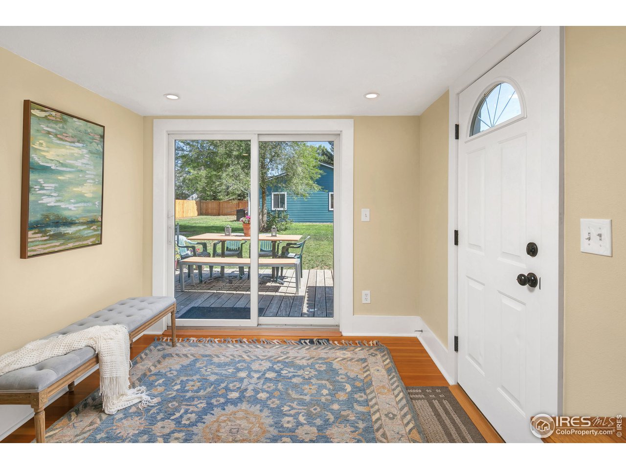 1500 West Prospect Road Fort Collins, CO 80526 - Photo 5 of 34 a living room with a large window