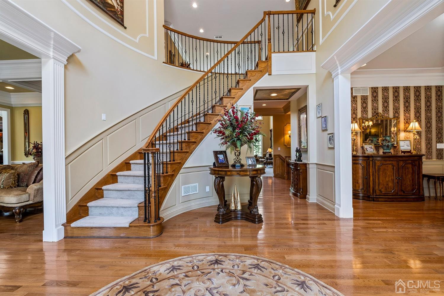 12 Horseshoe Court Monroe Township, NJ 08831 - Photo 4 of 81 a view of entryway and hall with wooden floor
