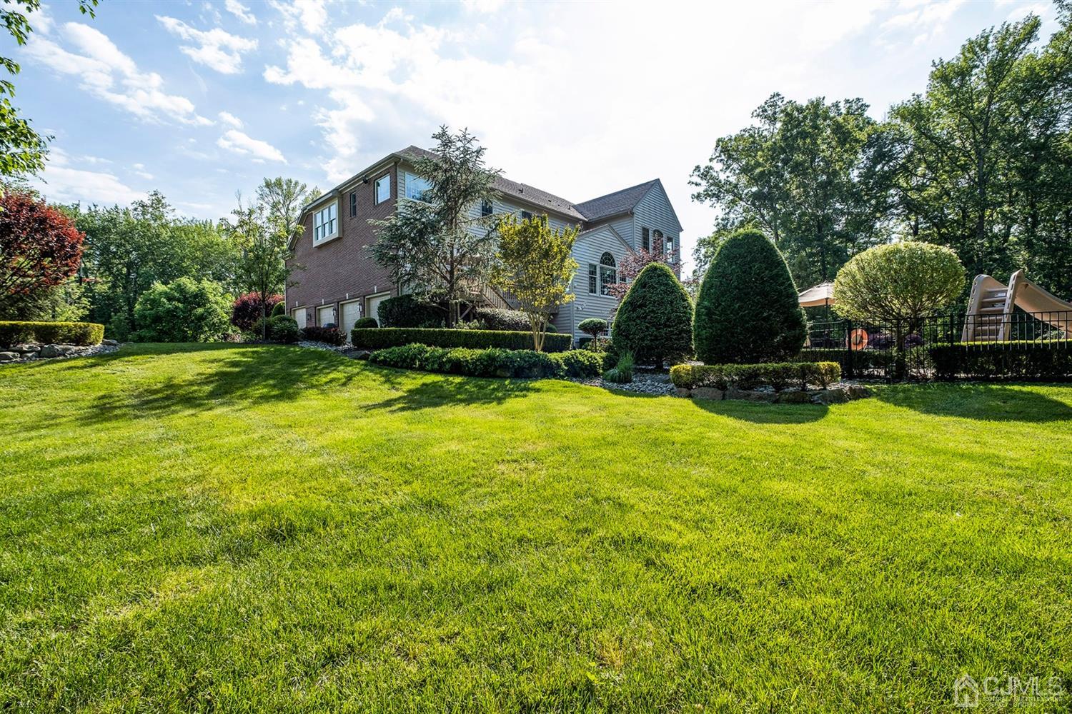 12 Horseshoe Court Monroe Township, NJ 08831 - Photo 32 of 81 a view of a house with backyard and sitting area