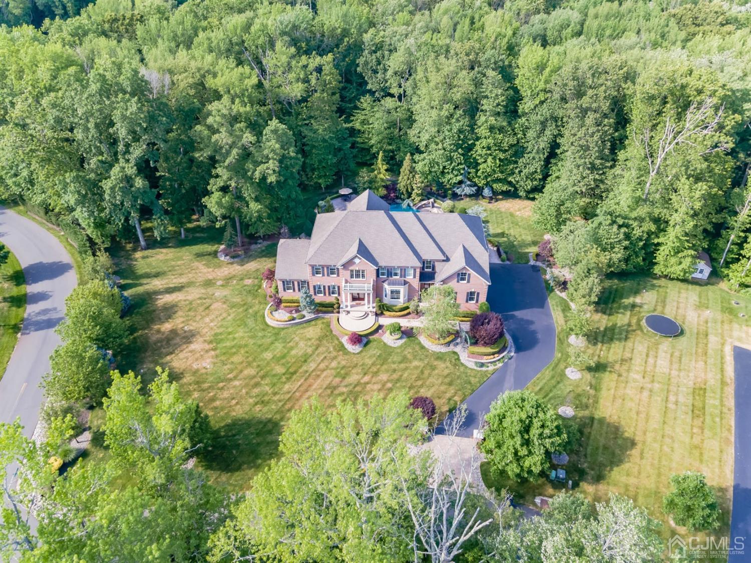 12 Horseshoe Court Monroe Township, NJ 08831 - Photo 40 of 81 an aerial view of a house with swimming pool and garden