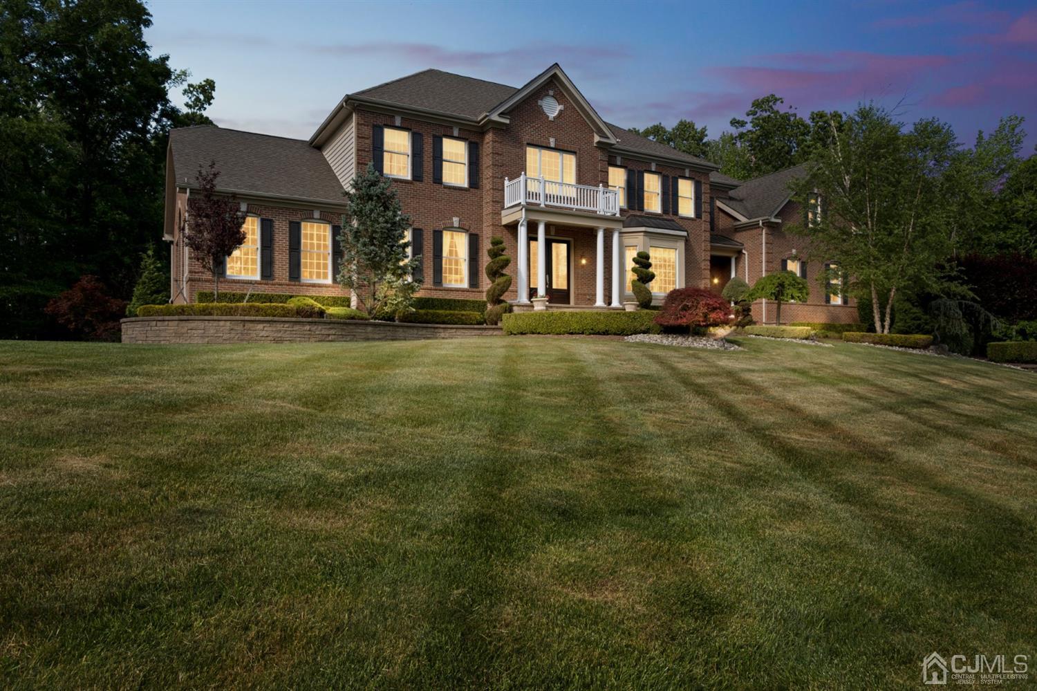 12 Horseshoe Court Monroe Township, NJ 08831 - Photo 48 of 81 a front view of a residential apartment building with a yard