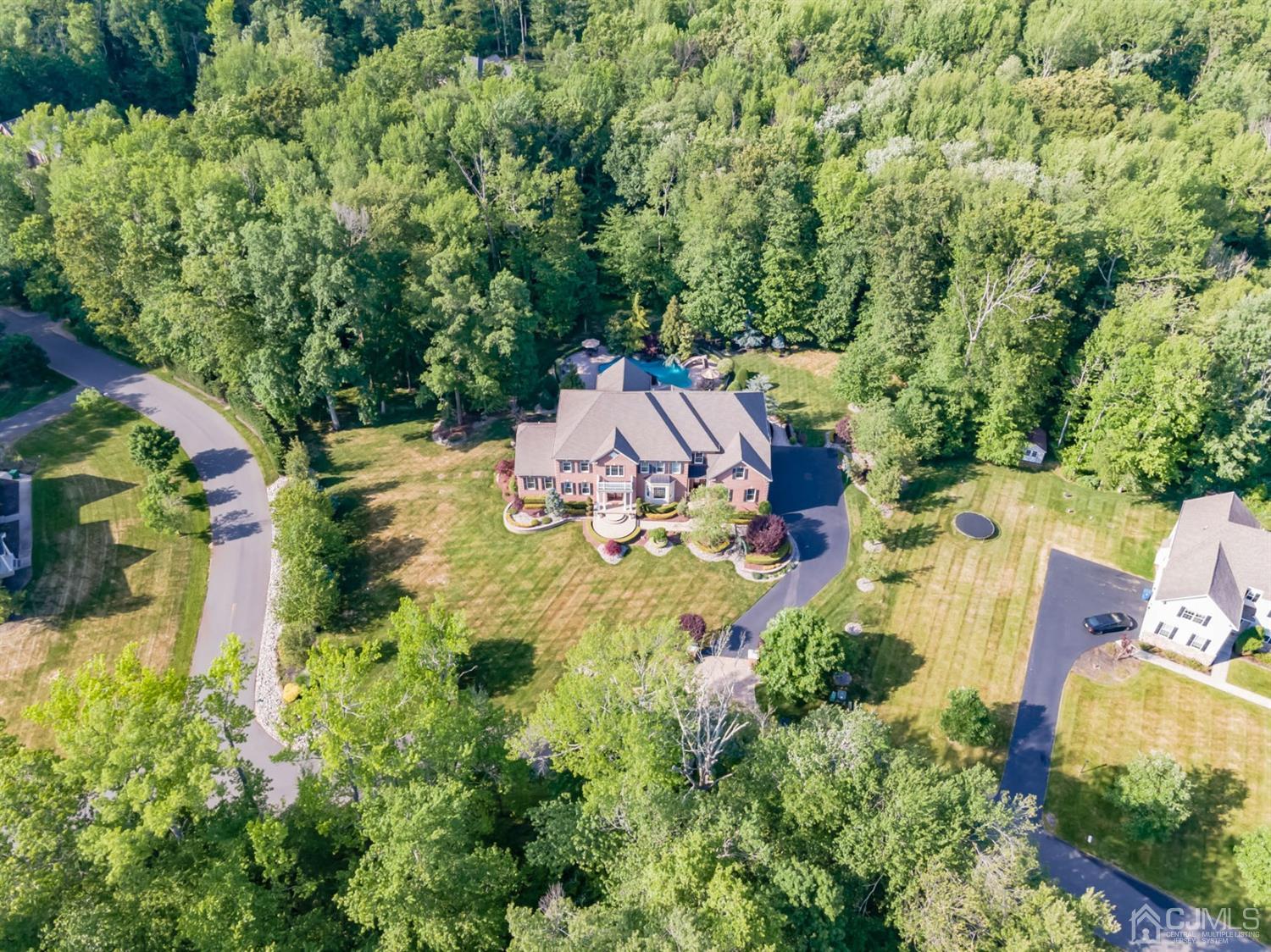 12 Horseshoe Court Monroe Township, NJ 08831 - Photo 50 of 81 an aerial view of residential house with outdoor space and trees all around
