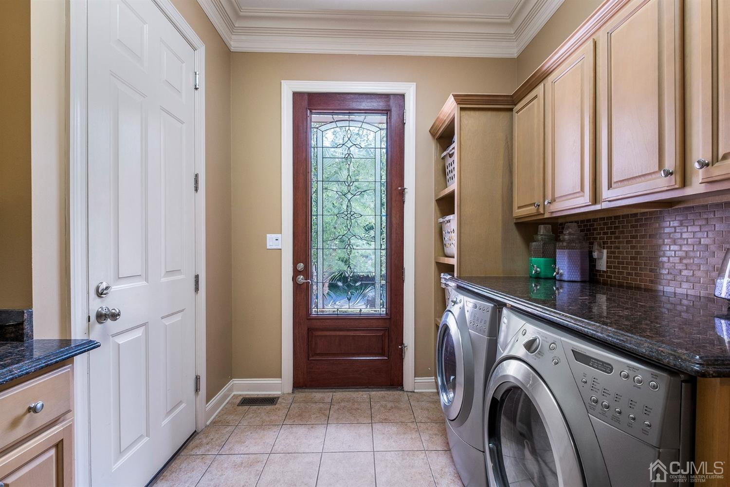 12 Horseshoe Court Monroe Township, NJ 08831 - Photo 59 of 81 a view of a kitchen with washer and dryer