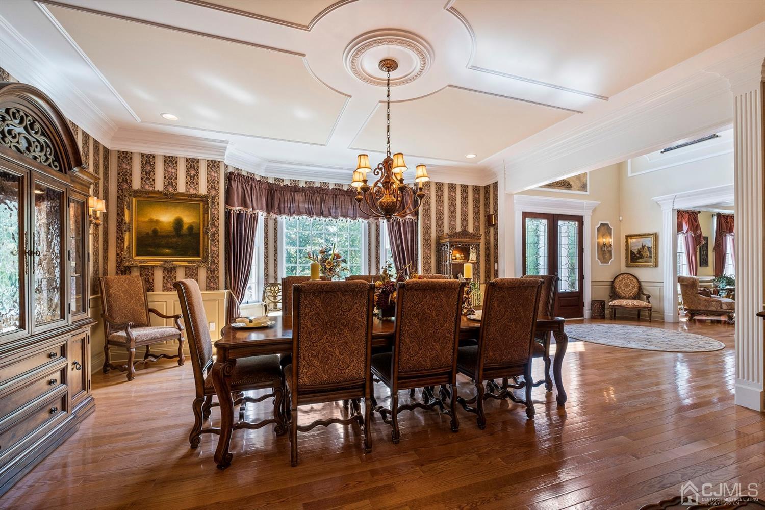 12 Horseshoe Court Monroe Township, NJ 08831 - Photo 7 of 81 a view of a dining room with furniture window and wooden floor