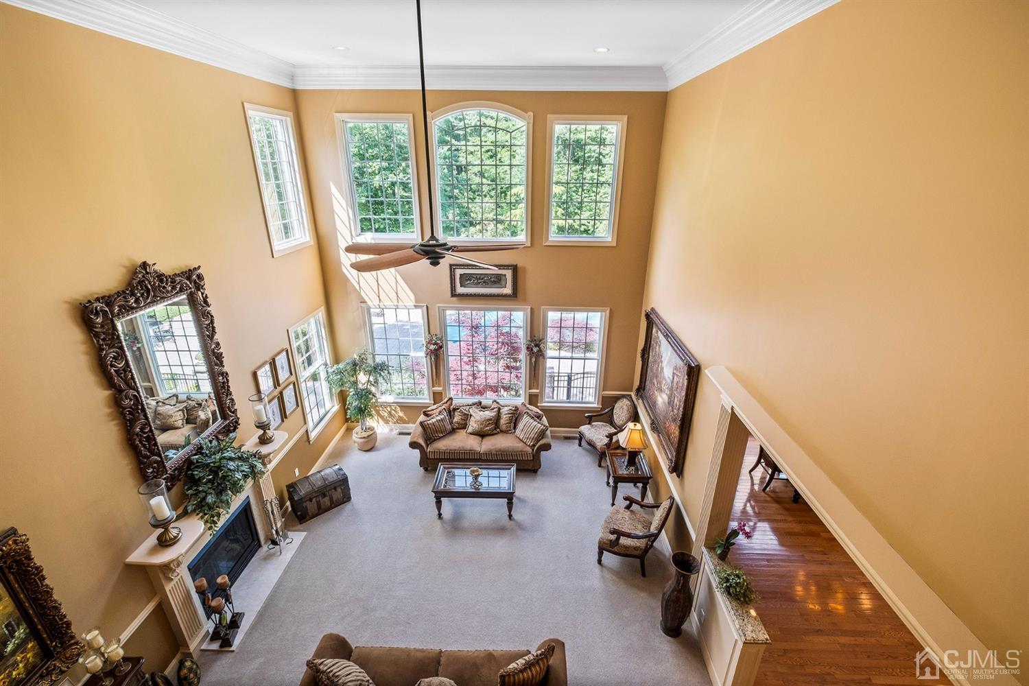 12 Horseshoe Court Monroe Township, NJ 08831 - Photo 71 of 81 a view of a livingroom with furniture and a window