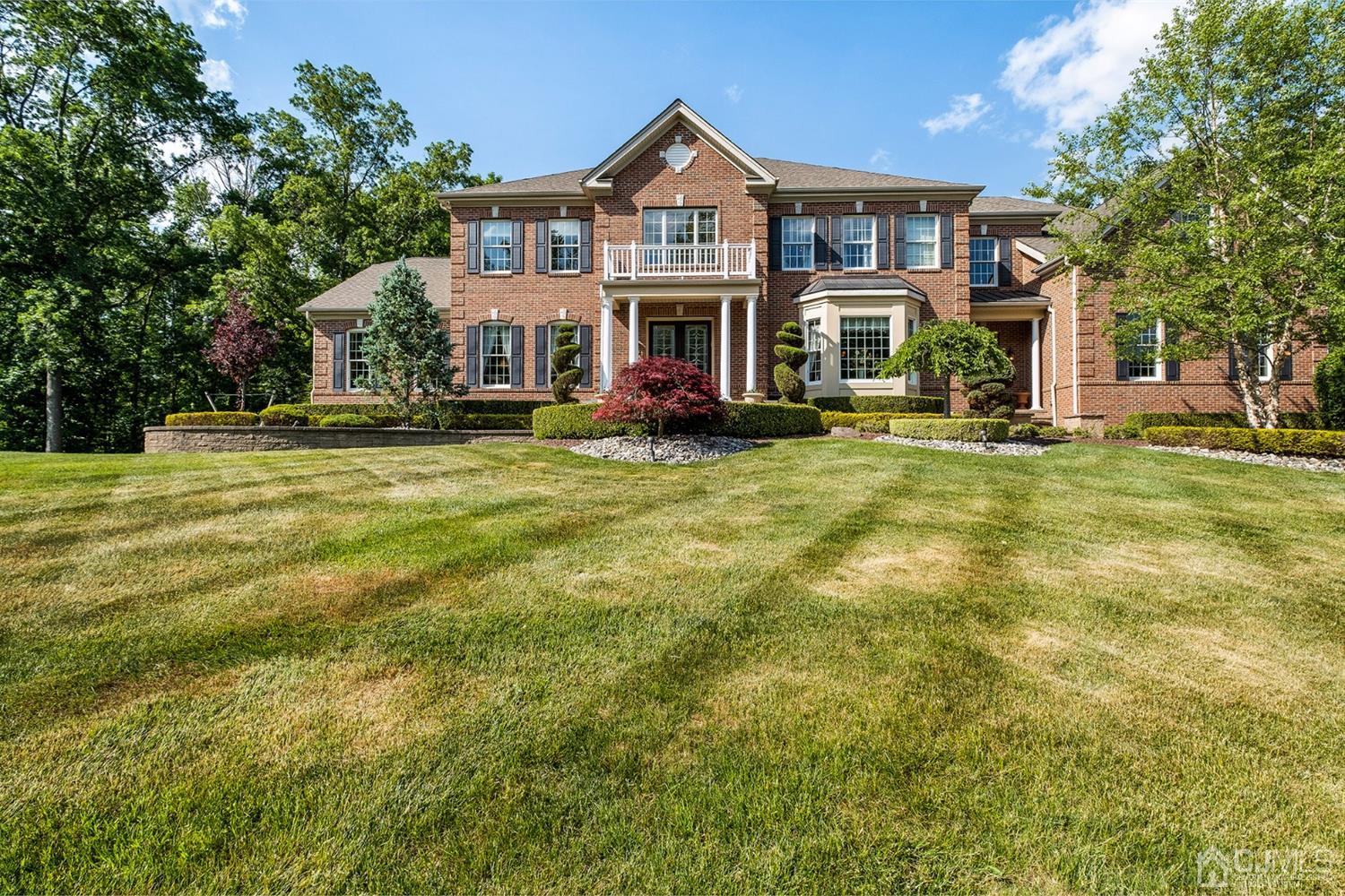 12 Horseshoe Court Monroe Township, NJ 08831 - Photo 78 of 81 a front view of a residential houses with yard and green space