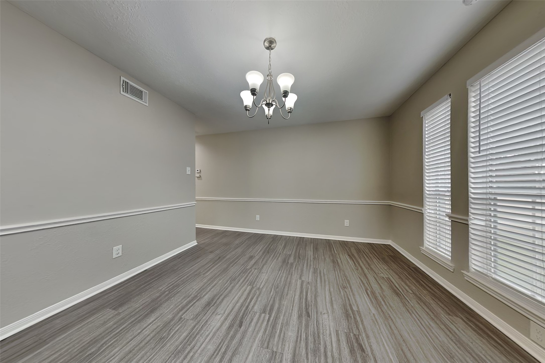 16910 Canyon Laurel Court Spring, TX 77379 - Photo 9 of 21 a view of a room with wooden floor and a window