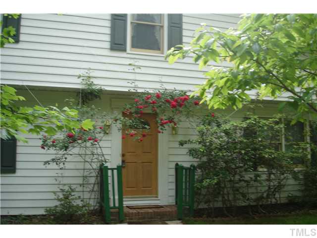 6240 Lookout Loop Raleigh, NC 27612 - Photo 2 of 19 a view of a house with a tree