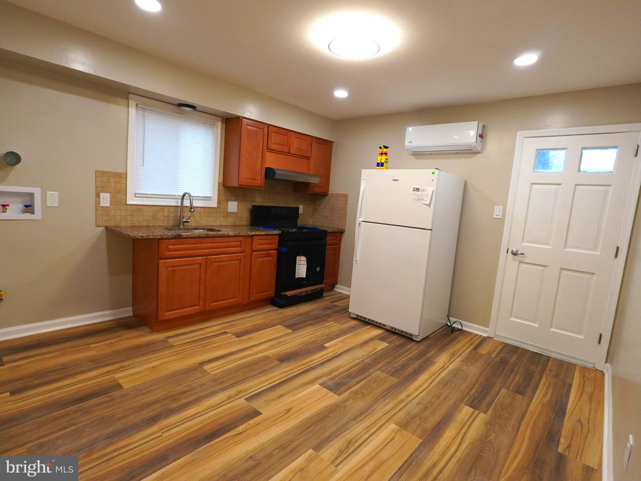 710 North York Road Willow Grove, PA 19090 - Photo 14 of 16 a kitchen with stainless steel appliances granite countertop a refrigerator a stove top oven a sink and dishwasher