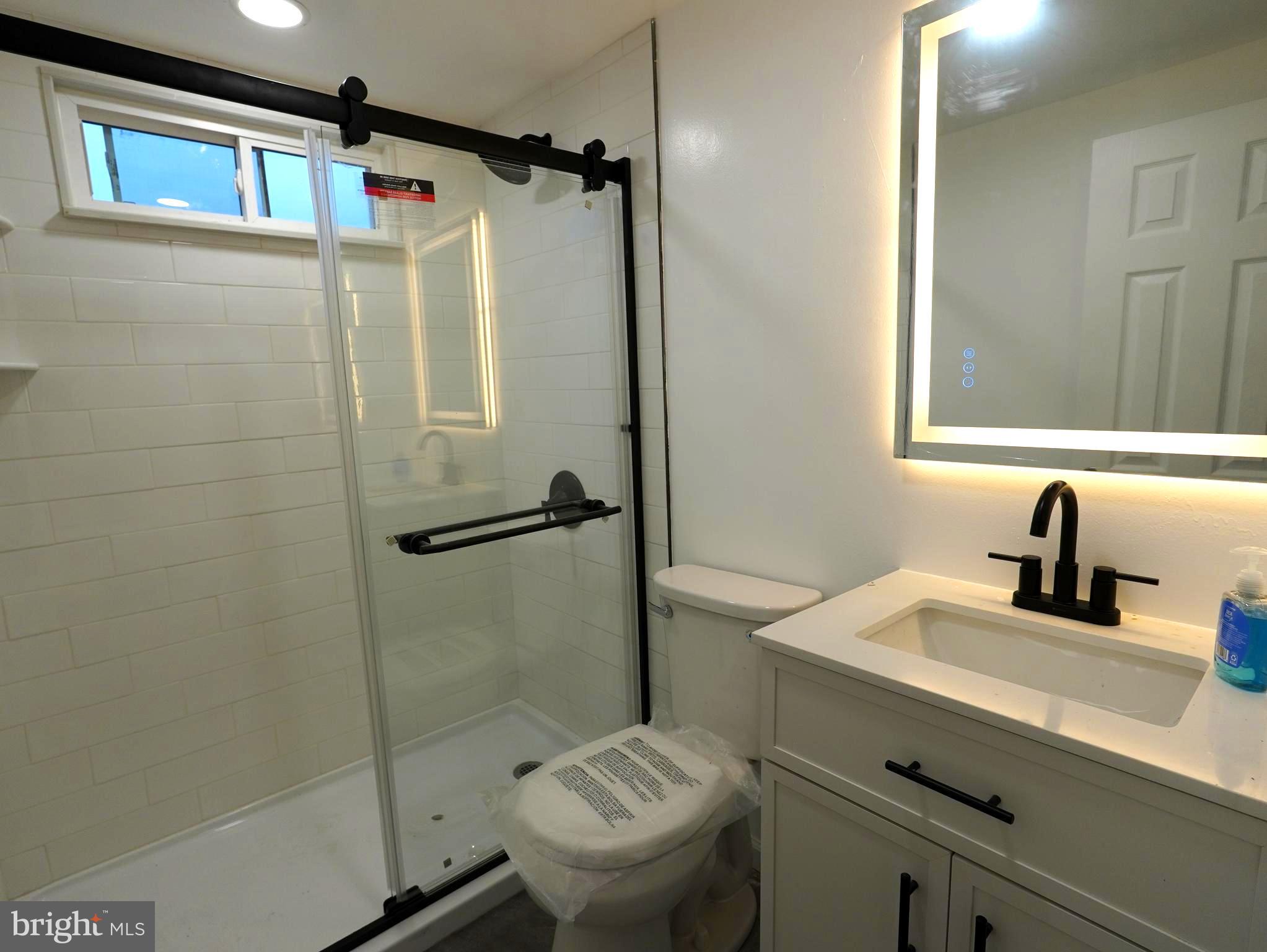 710 North York Road Willow Grove, PA 19090 - Photo 15 of 16 a bathroom with a sink a toilet and shower