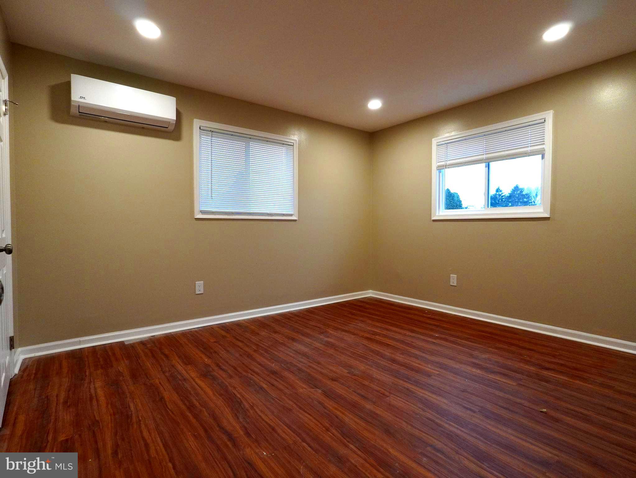 710 North York Road Willow Grove, PA 19090 - Photo 7 of 16 a view of room with wooden floor and window