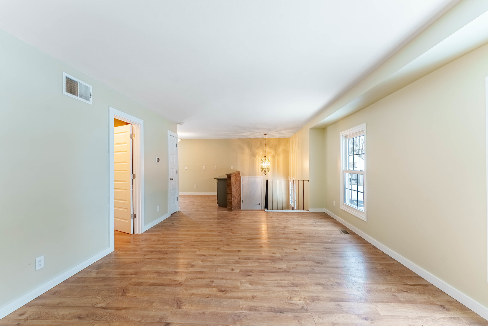 1359 Madison Court St. Charles, IL 60174 - Photo 11 of 23 a view of a livingroom with wooden floor and window