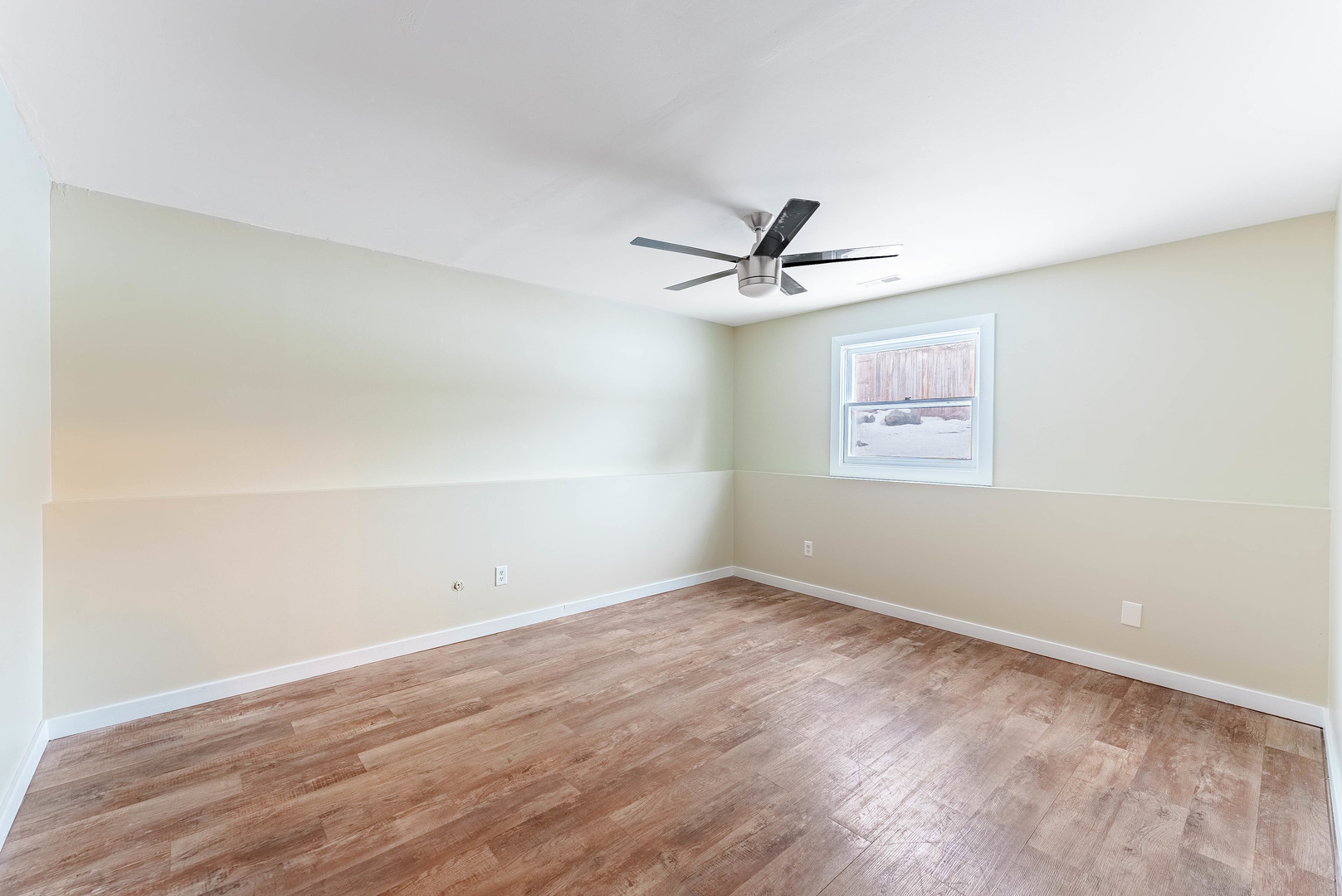 1359 Madison Court St. Charles, IL 60174 - Photo 14 of 23 a view of a room with wooden floor and white walls