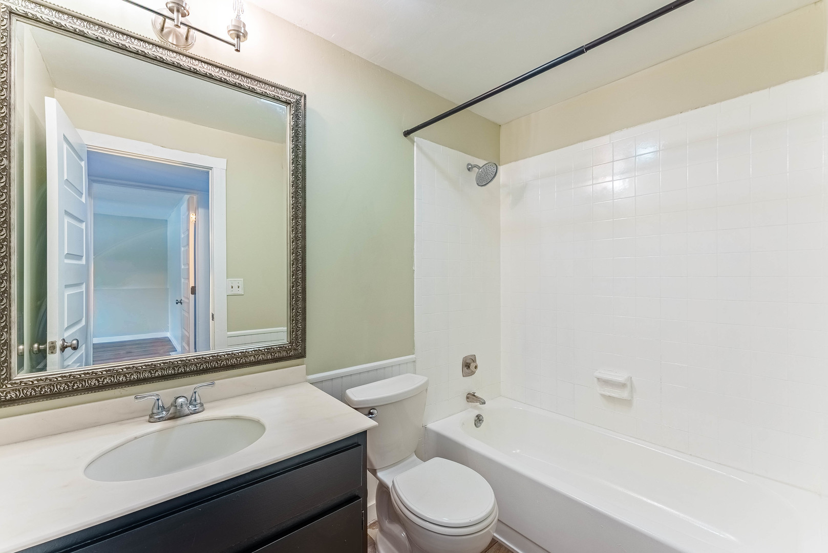 1359 Madison Court St. Charles, IL 60174 - Photo 18 of 23 a bathroom with a sink a toilet a mirror and shower