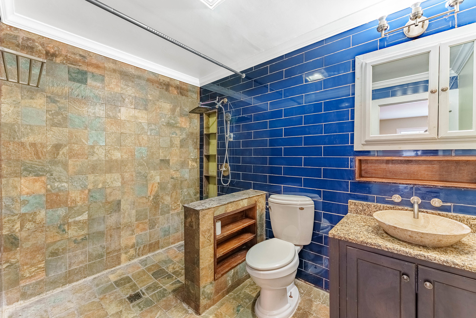 1359 Madison Court St. Charles, IL 60174 - Photo 8 of 23 a bathroom with a granite countertop toilet a sink and a mirror