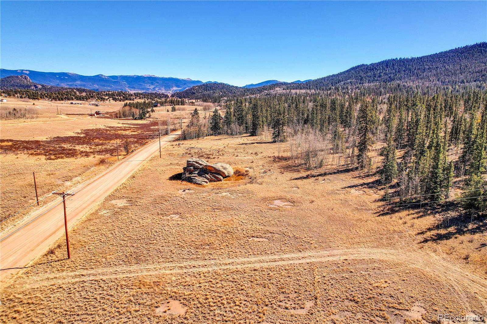 778 Chief Trail Como, CO 80456 - Photo 2 of 50 a view of a lake with a mountain