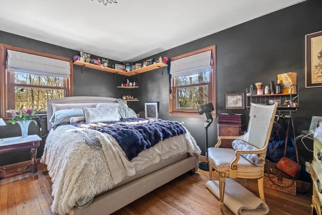 a view of a backyard with swimming pool