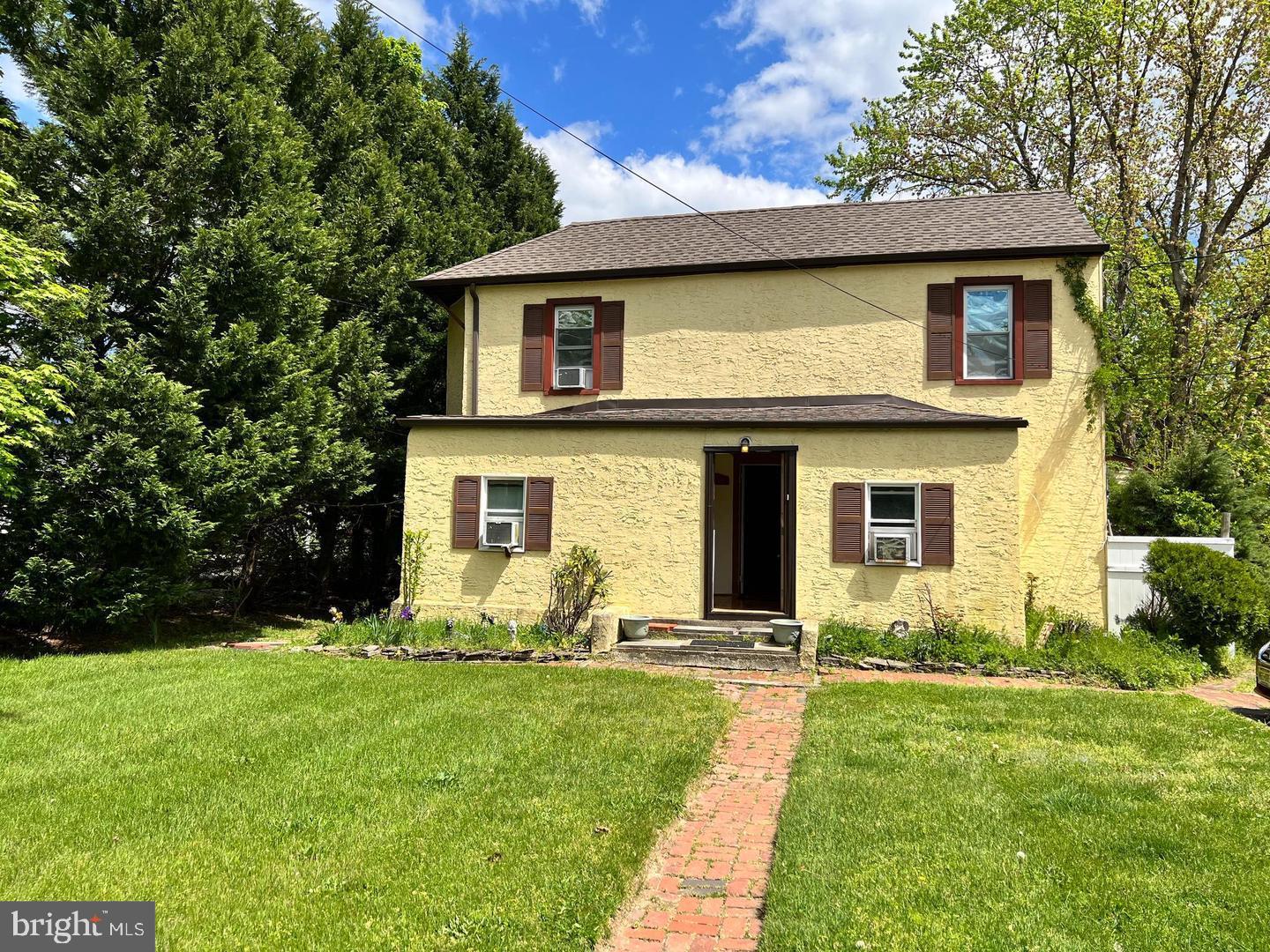 153 New Freedom Road Berlin, NJ 08009 - Photo 1 of 19 a front view of a house with a yard