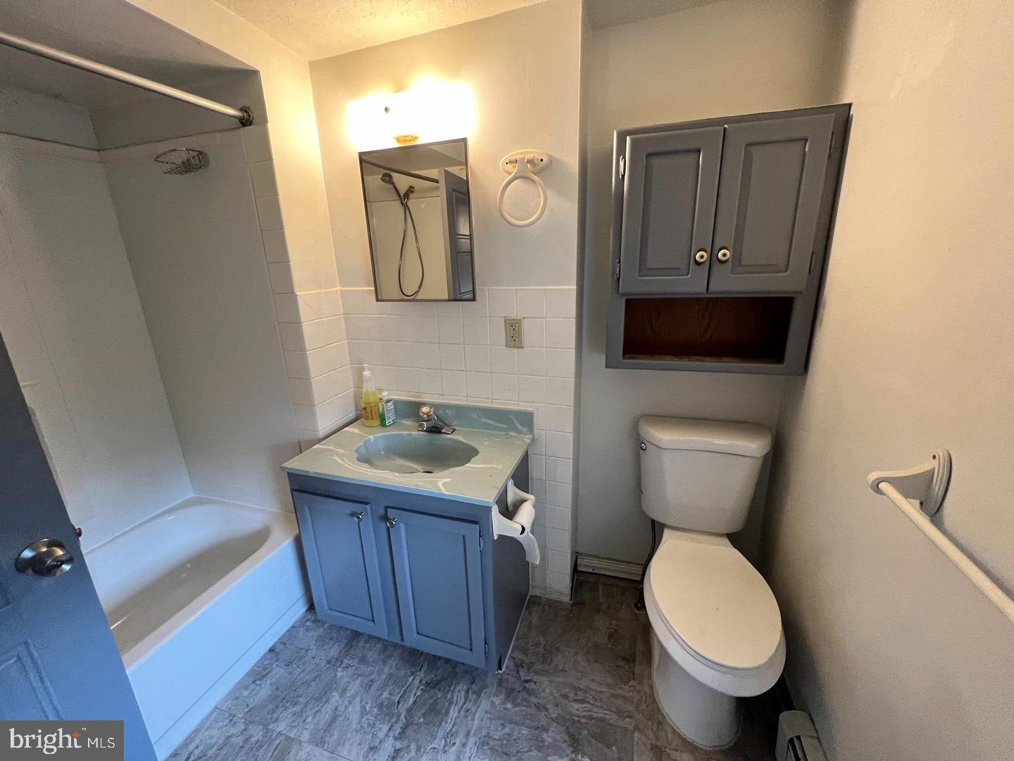 153 New Freedom Road Berlin, NJ 08009 - Photo 9 of 19 a bathroom with a toilet sink and mirror