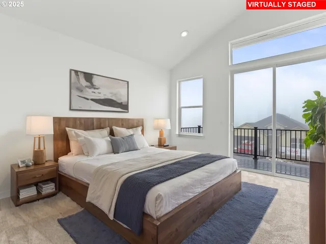 a bedroom with bed and a window