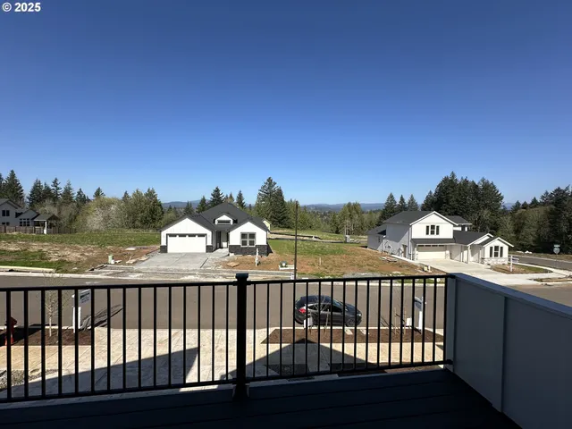 a view of a street from a balcony