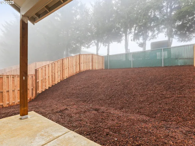 a view of backyard with green space