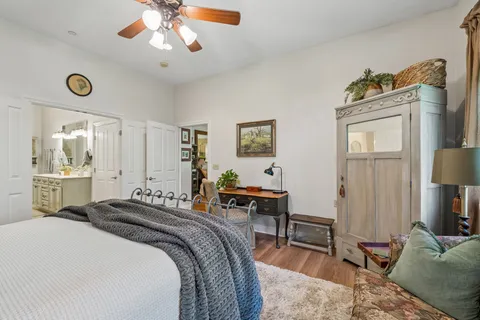 a spacious bathroom with a double vanity sink and a mirror