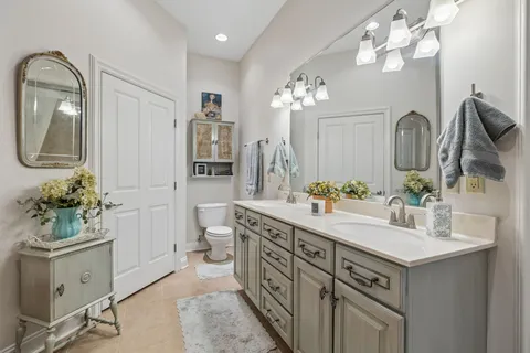 a bathroom with a bathtub and a sink