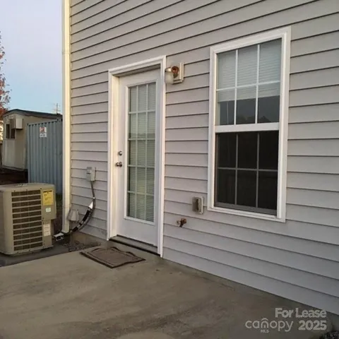 a view of entrance gate of a house