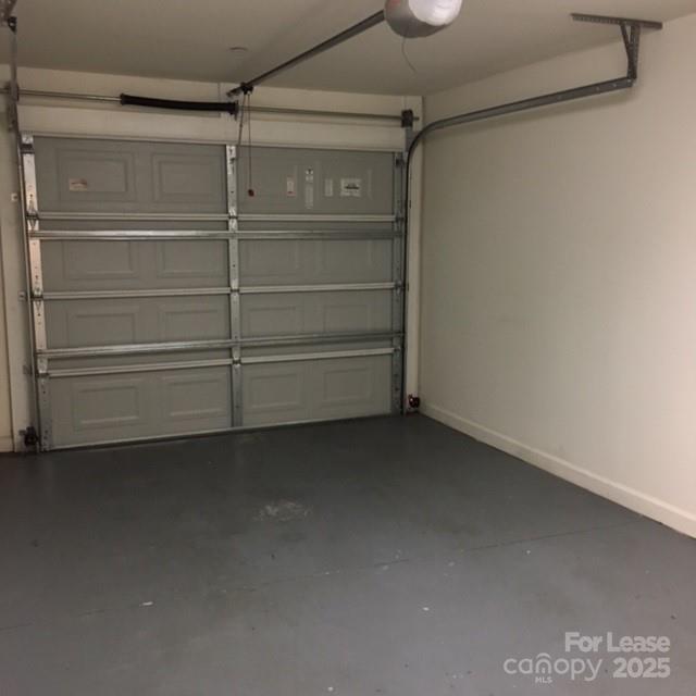 914 D Brawley School Road, Unit D Mooresville, NC 28117 - Photo 3 of 13 a view of walk in closet with empty racks
