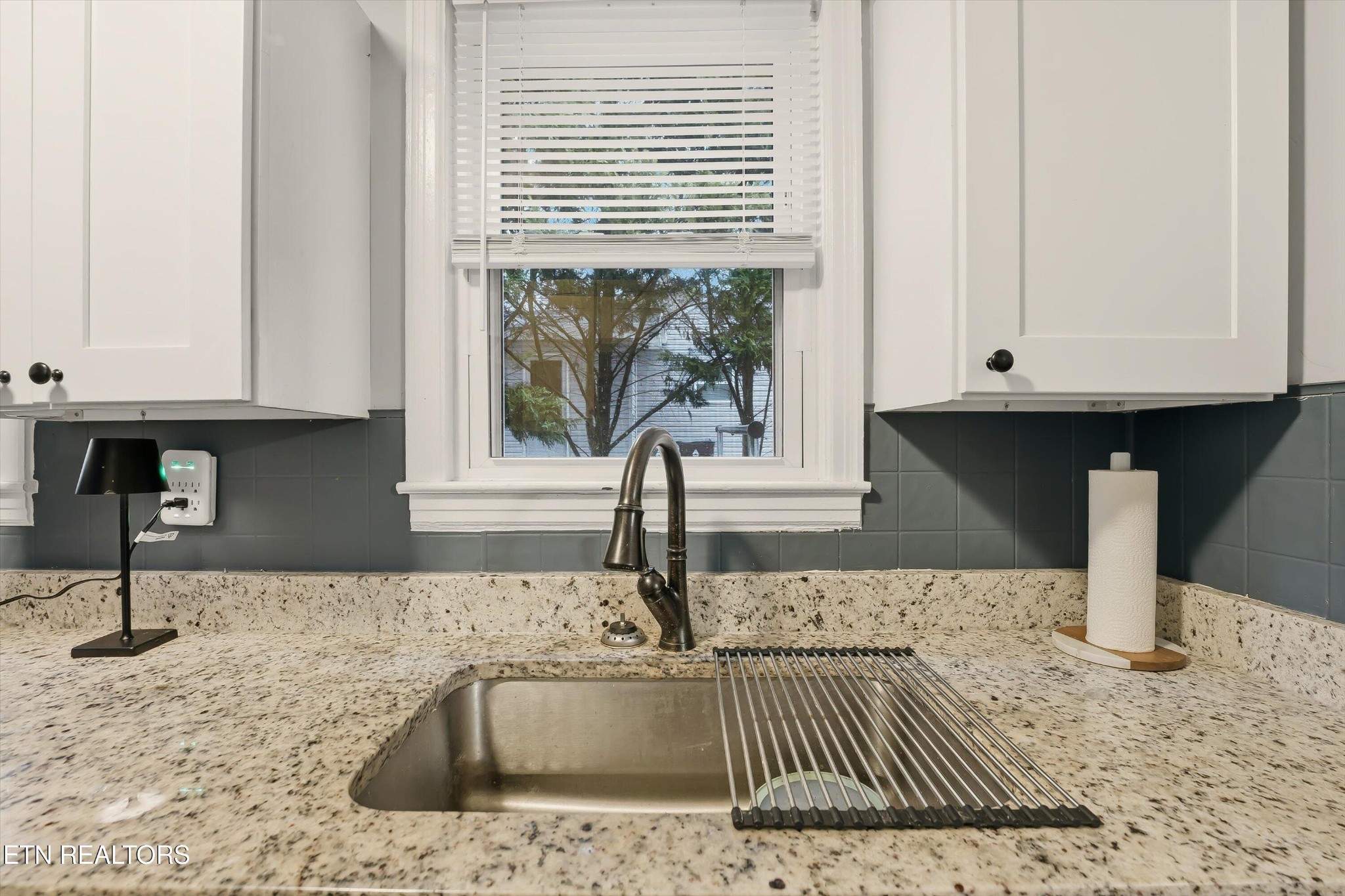 1741 North Wright Road Alcoa, TN 37701 - Photo 12 of 31 a kitchen with granite countertop a sink and a window