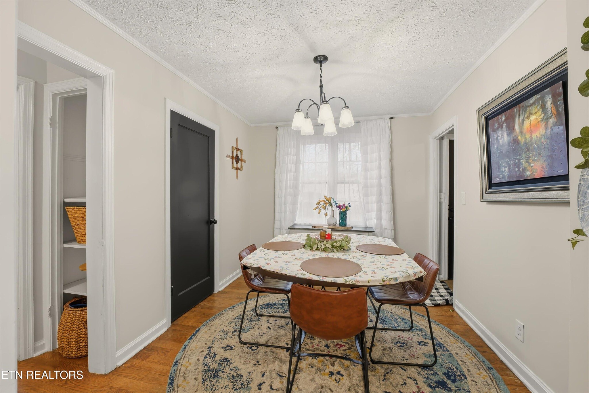 1741 North Wright Road Alcoa, TN 37701 - Photo 14 of 31 a view of a dining room with furniture and wooden floor