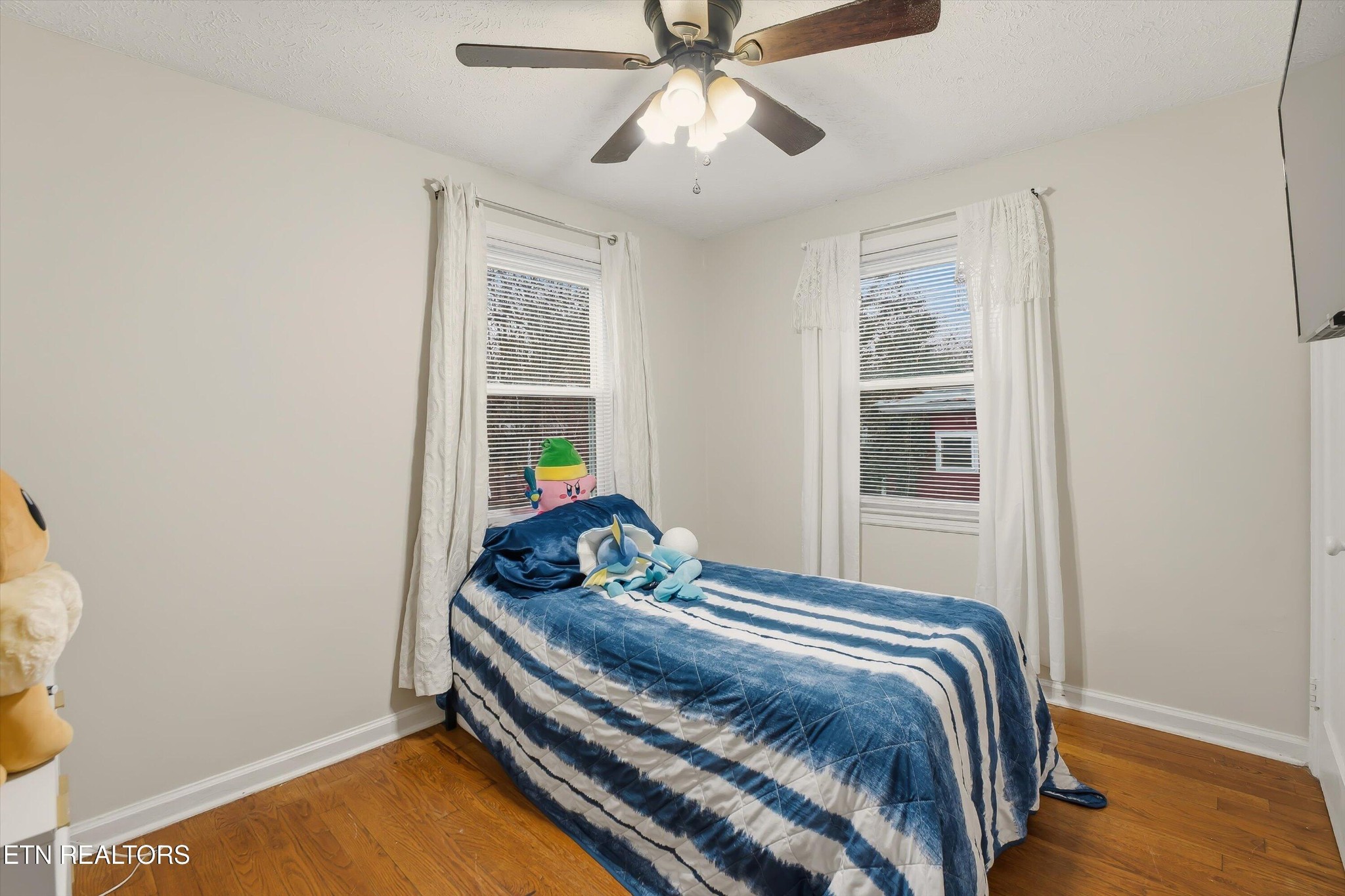 1741 North Wright Road Alcoa, TN 37701 - Photo 17 of 31 a bedroom with a bed and a window