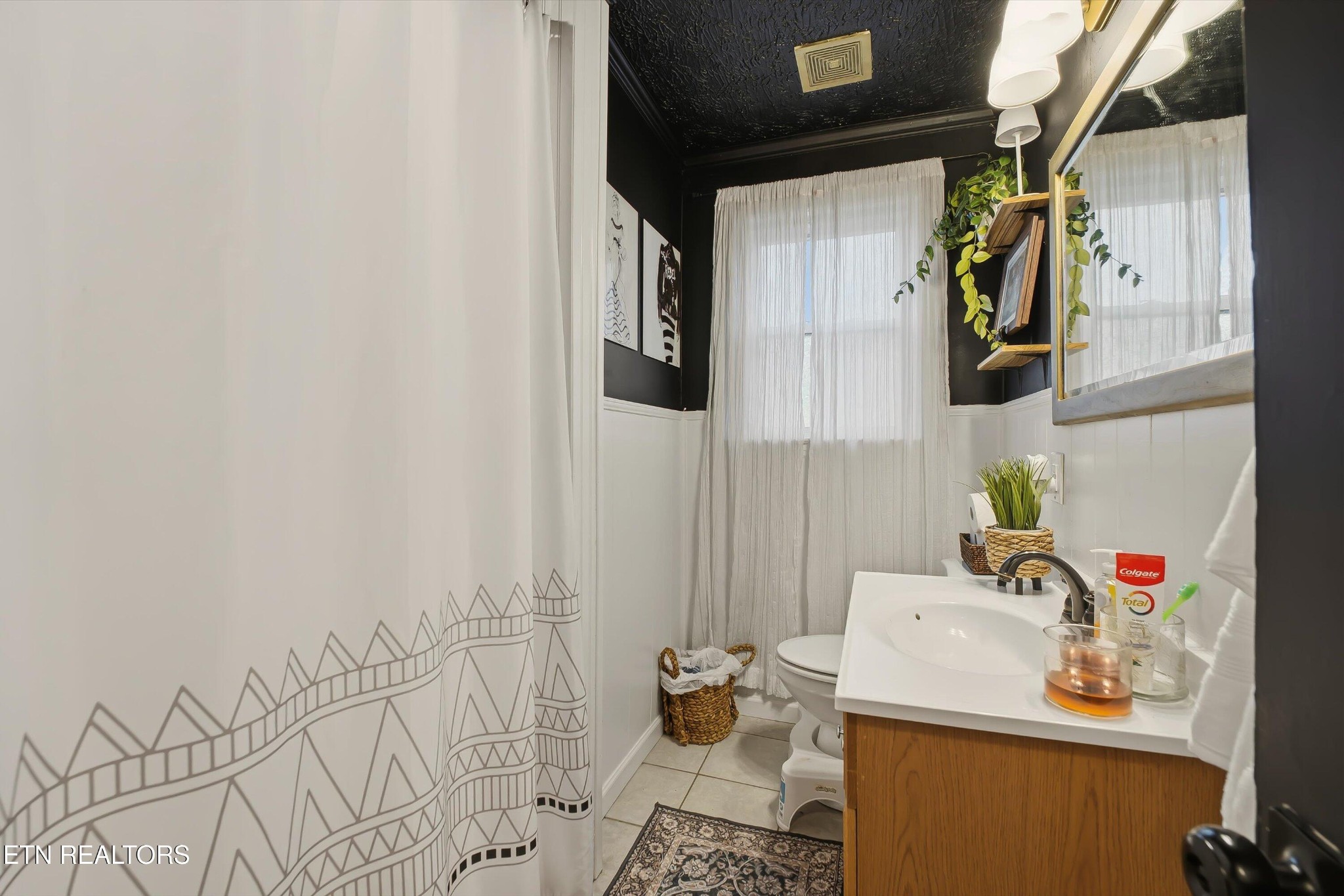 1741 North Wright Road Alcoa, TN 37701 - Photo 21 of 31 a bathroom with a sink and a mirror