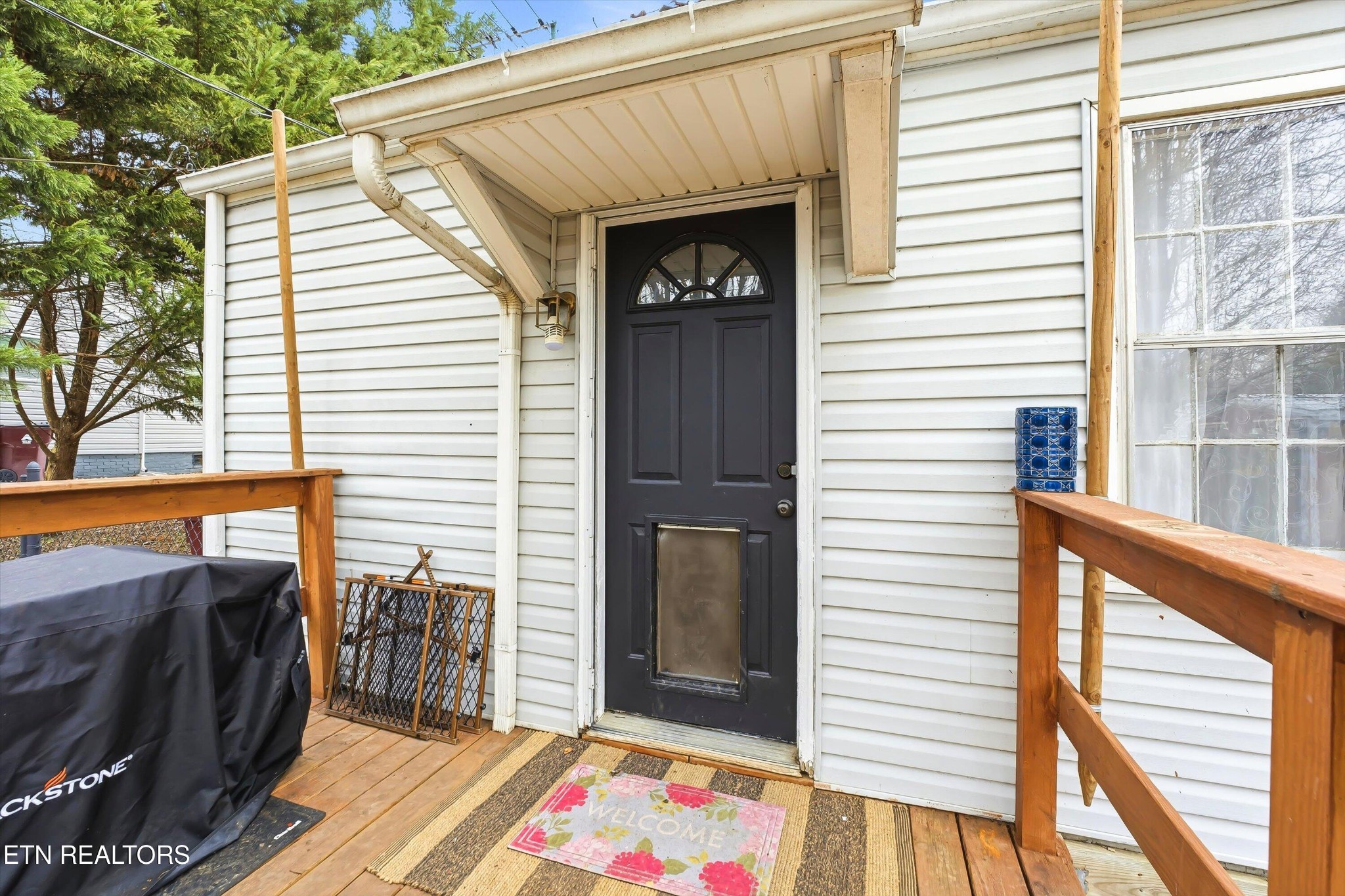 1741 North Wright Road Alcoa, TN 37701 - Photo 23 of 31 a view of a porch with furniture and front door