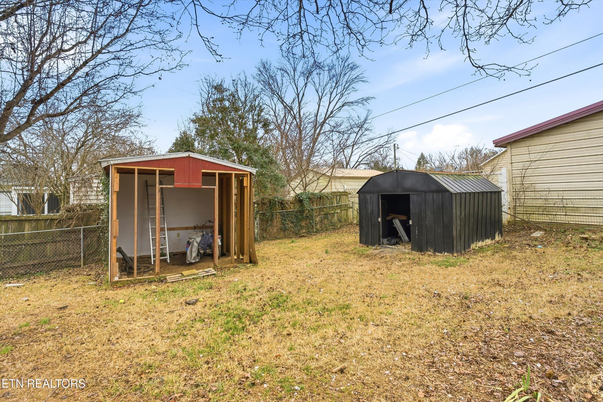 1741 North Wright Road Alcoa, TN 37701 - Photo 25 of 31 a view of a house with a yard covered in snow