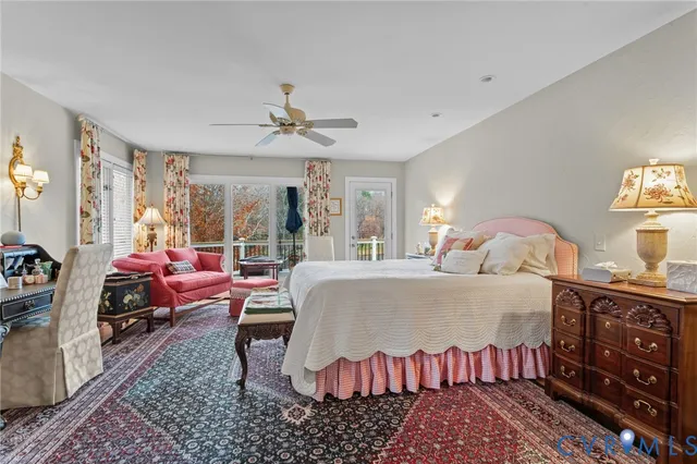 a bed room with a bed and a couch